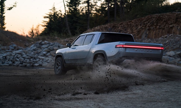 Elon Musk says his pickup will cost much less than the Rivian RT1