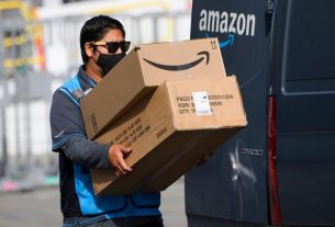 Amazon profits grow 48%; warns of slow growth